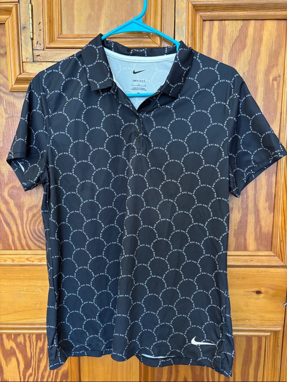 Nike Black Polo with White Scallop Dot Pattern